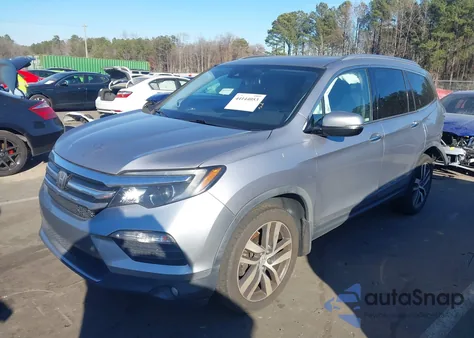 2017 Honda Pilot Touring z USA, uszkodzony, nr VIN 5FNYF6H96HB099542